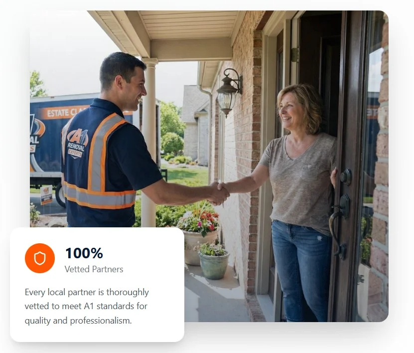 A1 Removal Experts professional technician shaking hands with a satisfied customer at a residential property.